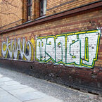 Grafittientfernung - Graffiti an Flinkerfassade